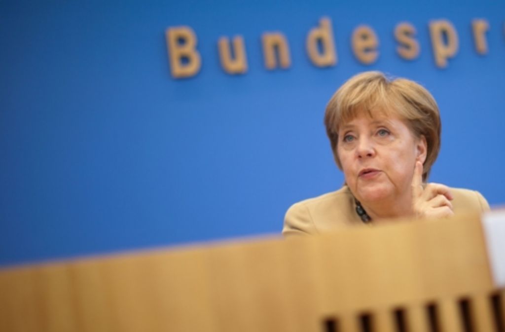Angela Merkel bei ihrem Auftritt in der Bundespressekonferenz in Berlin Foto: dpa