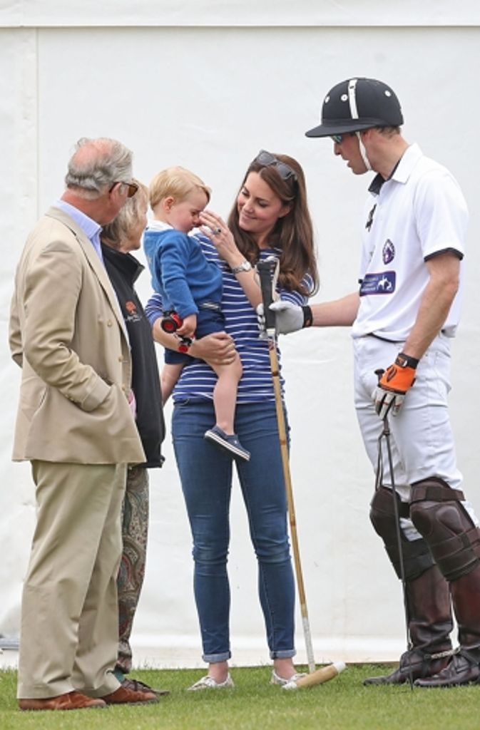 Prinz Charles, Prinz George, Herzogin Kate und Prinz Harry (von links)