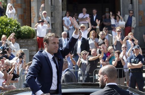 Der französische Staatspräsident Emmanuel Macron hat allen Grund zur Freude. Foto: AP