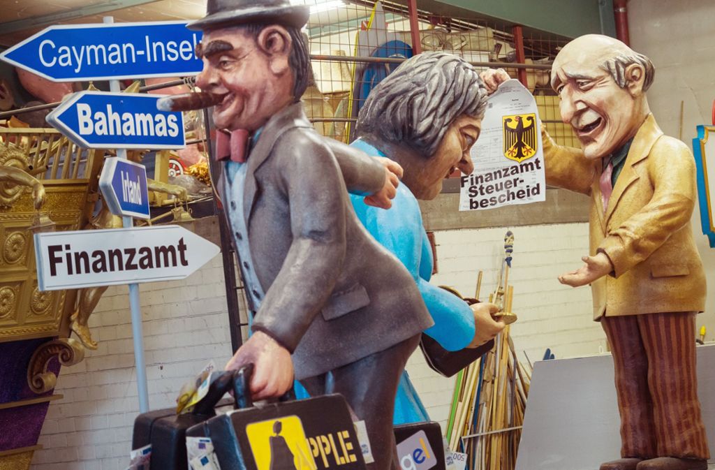 Der Mainzer Motivwagen „Arme Schlucker“ befasst sich mit der Bankenrettung, während der Normalbürger zur Kasse gebeten wird.