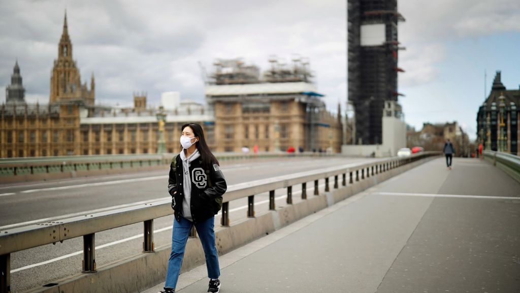 Pandemie in  Großbritannien: London duckt sich unter grauem Himmel
