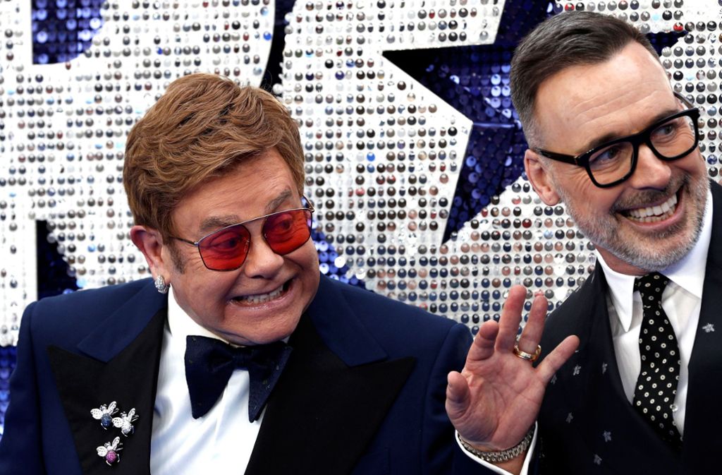 Elton John und David Furnish strahlten was das Zeug hält.