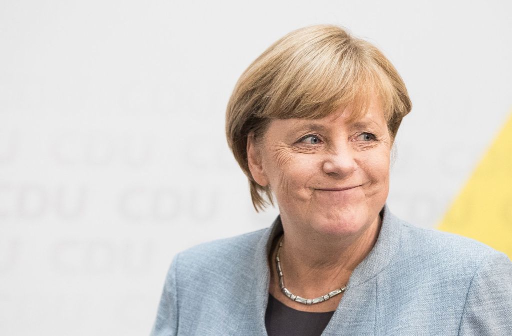 Merkel am Tag nach der Wahl: Die Schlappe lässt sich nicht weglächeln. Foto: Getty