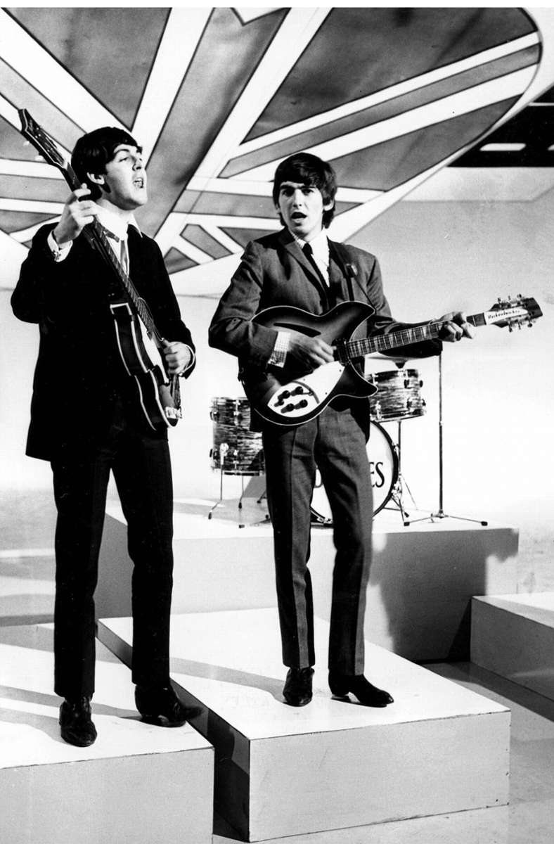 1964: Paul McCartney (links) und George Harrison