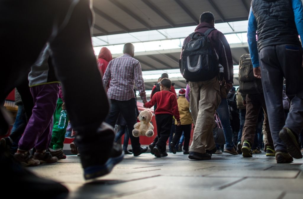 Flüchtlinge kommen am Bahnhof in München an (Symbolbild). Foto: dpa