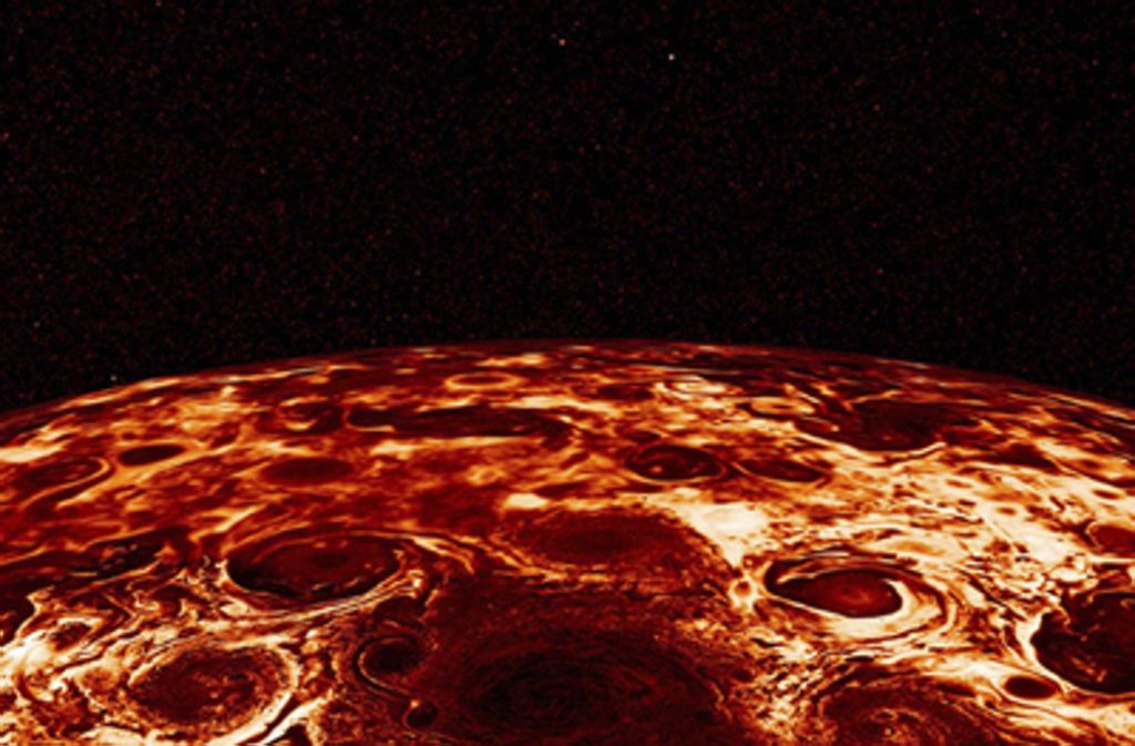 Jupiter hat keine feste Oberfläche und keine klar begrenzte Atmosphäre. Fast der ganze Planet besteht aus Gasen. Er könnte aber über einen festen Kern verfügen.