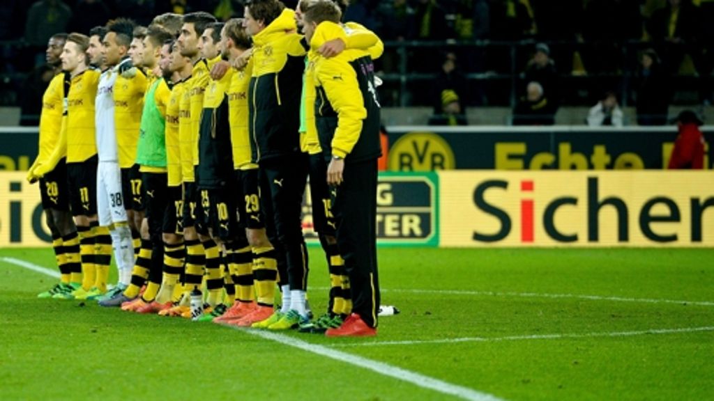 Partie Dortmund-Mainz: Tod im Stadion: das Spiel gerät zur Nebensache