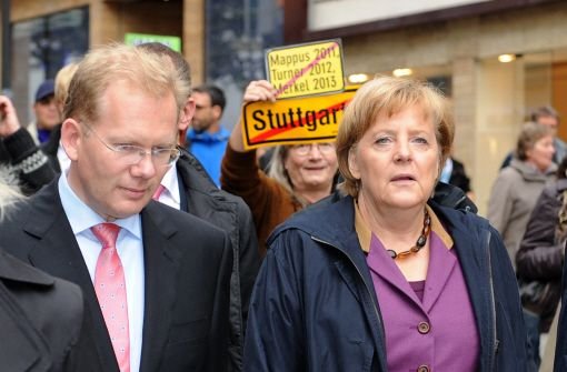 Kanzlerin Angela Merkel wurde in Stuttgart auch von Stuttgart-21-Gegnern empfangen. Foto: dpa