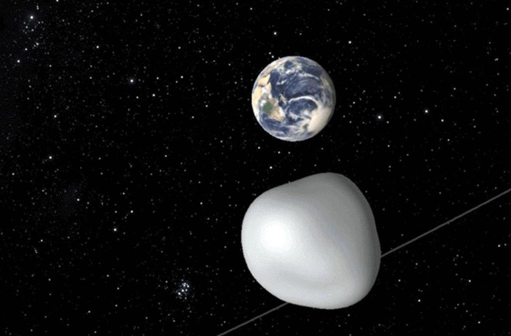 2017: Eine Computersimulation der Nasa zeigt den Asteroid 2012 TC4 (vorne), der am 12. Oktober 2017 in einer Entfernung von 44 000 Kilometern an der Erde vorbeiflog.
