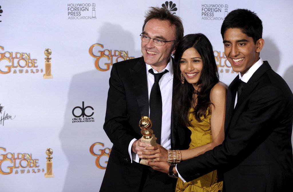 Bester Film 2009: „Slumdog Millionär“. Der britische Regisseur Danny Boyle (links) und die Schauspieler Freida Pinto und Dev Patel bekamen auch einen Golden Globe für den Film.