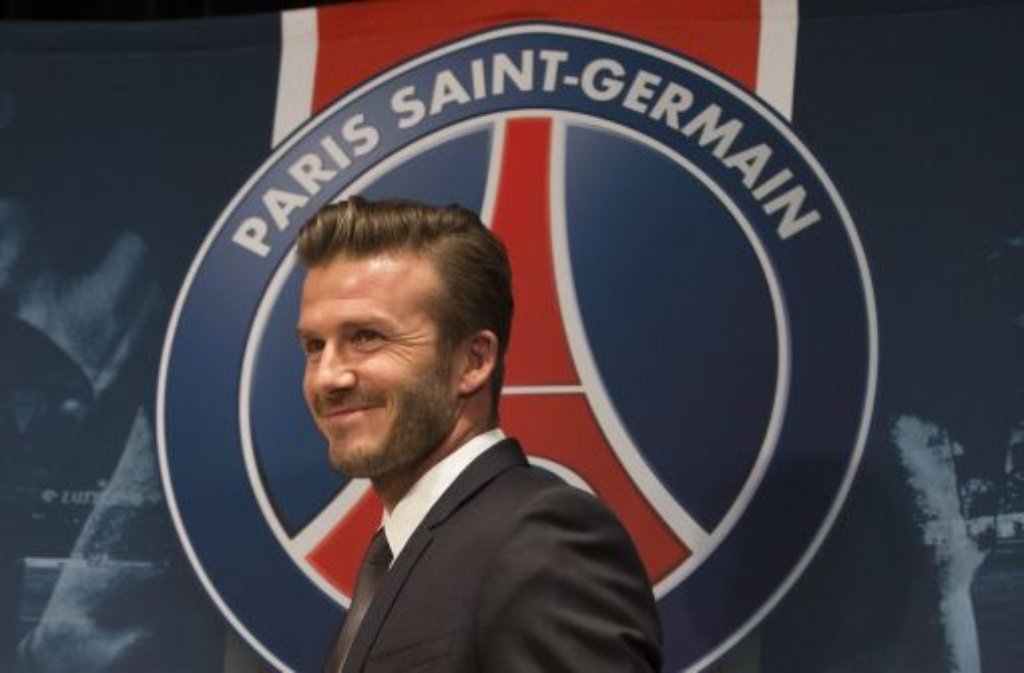 Wenige Wochen nach seinem Ausstieg bei Los Angeles Galaxy hatte Beckham Ende Januar 2013 überraschend beim französischen Tabellenführer Paris Saint Germain angeheuert, wo er für eine halbe Saison die Fußballschuhe schnürte. Klicken Sie sich durch die Fotostrecke des englischen Superstars...