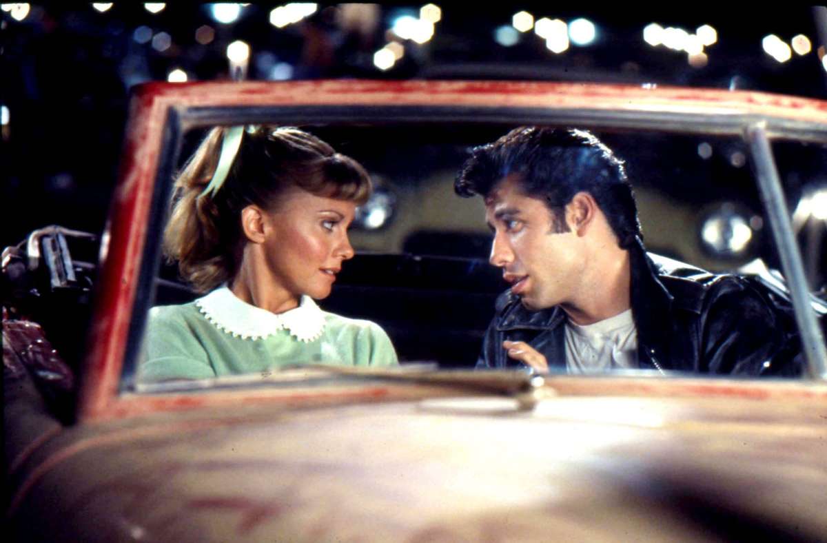 Olivia Newton-John als „Sandy“ und John Travolta als „Danny“ aus dem Film „Grease“. Foto: dpa/Paramount Pictures