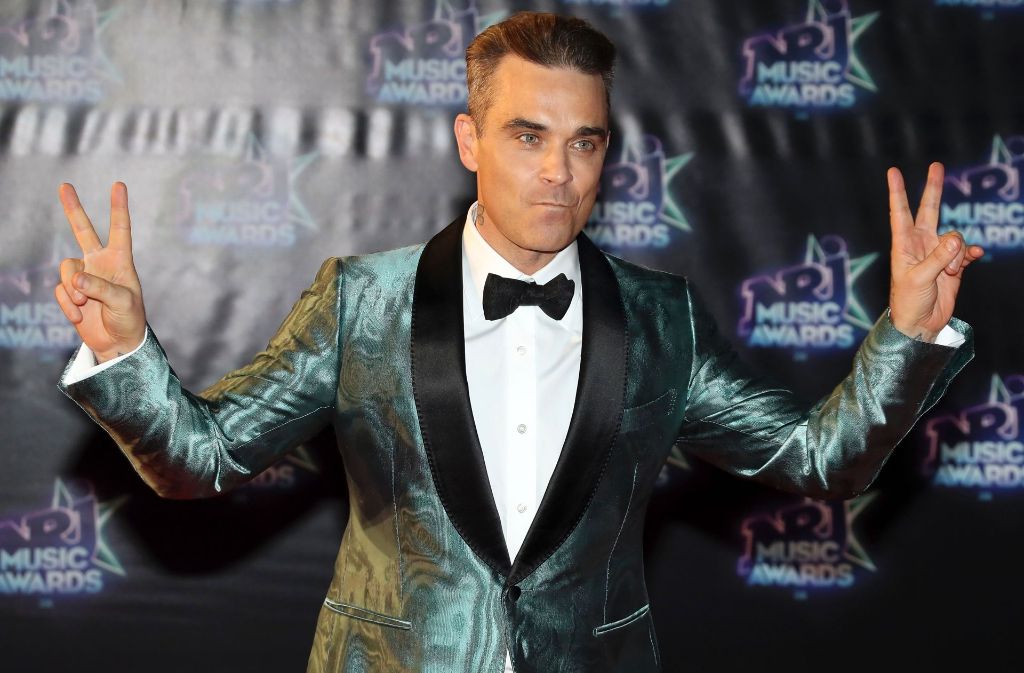Robbie Williams Gewichtsschwankungen bleiben niemandem verborgen. Auf diesem Foto von 2016 scheint er gerade eine „schlanke, depressive Phase“, wie er es selbst bezeichnet, durchlebt zu haben.