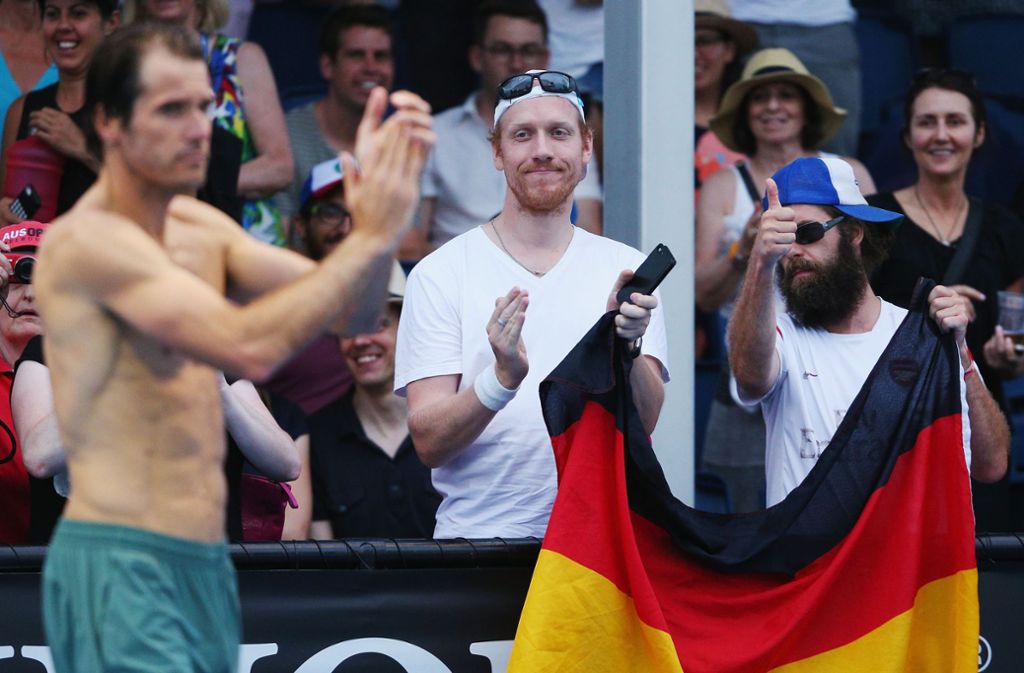 Auch deutsche Fans sind nach Down Under gereist – in diesem Fall, um Tommy Haas anzufeuern (links).