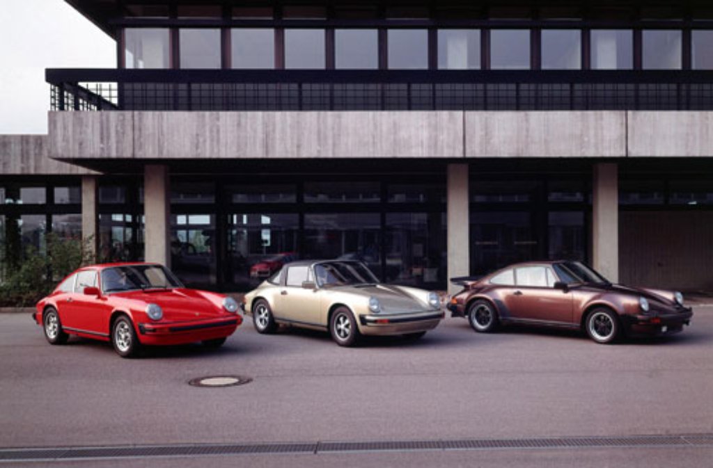 1976: Porsche 911 Turbo 3.0 Coupé, Porsche 911 Carrera 3.0 Targa und Porsche 911 2.7 Coupé (von rechts nach links)