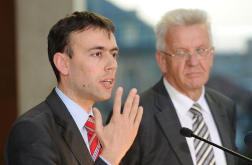 Nils Schmid (links) und Winfried Kretschmann müssen den Konflikt mit den Beamten austragen. Foto: dpa