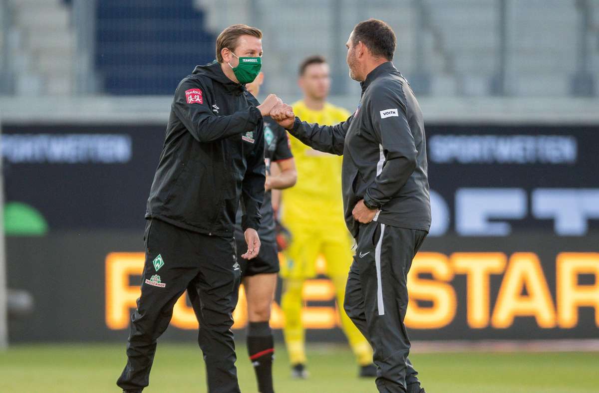 Ein Jahr später entscheidet wieder die Auswärtstorregel die Relegation. Der Zweitligadritte 1. FC Heidenheim mit Trainer Frank Schmidt (re.) holt im Hinspiel bei Werder Bremen ein 0:0. Nach dem 2:2 im Rückspiel in Heidenheim aber sichert sich Werder mit Trainer Florian Kohfeldt den Klassenverbleib.