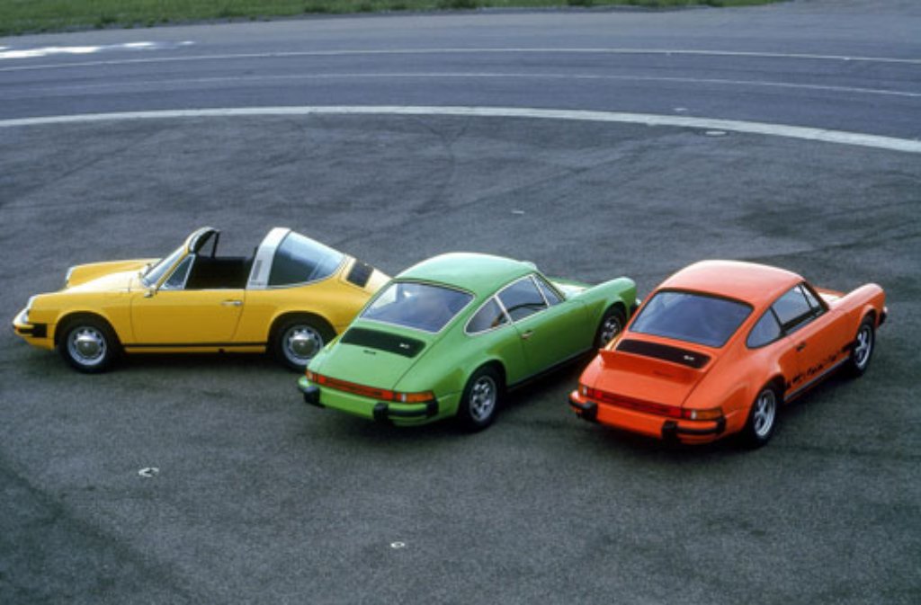 1974: Porsche 911 2.7 Targa (gelb), Porsche 911 S 2.7 Coupé (grün) und Porsche 911 Carrera 2.7 Coupé (rot)