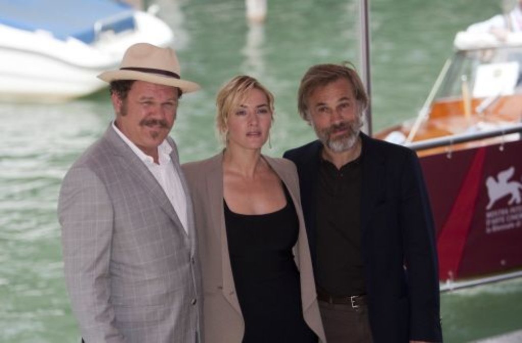 Die Schauspielerkollegen John C. Reilly, Kate Winslet und Christoph Waltz (von links)