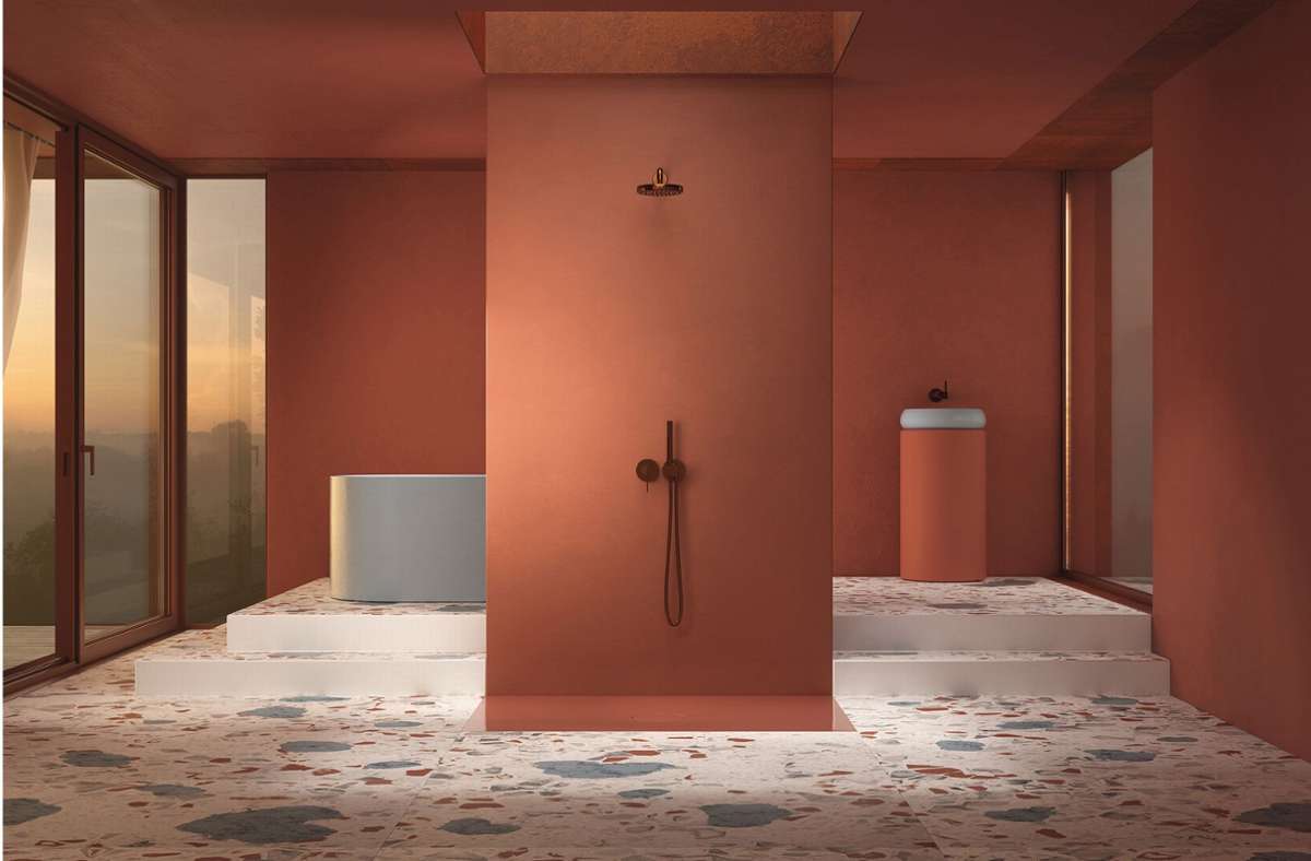 Eine neue Installationstechnik macht aus der Duschfläche eine Duschfliese. Sie wird direkt auf Estrich verklebt und verschmilzt mit dem sie umgebenden Belag endgültig zu einem planen Boden. Mutige Farbe: orange-rotes Carneol.