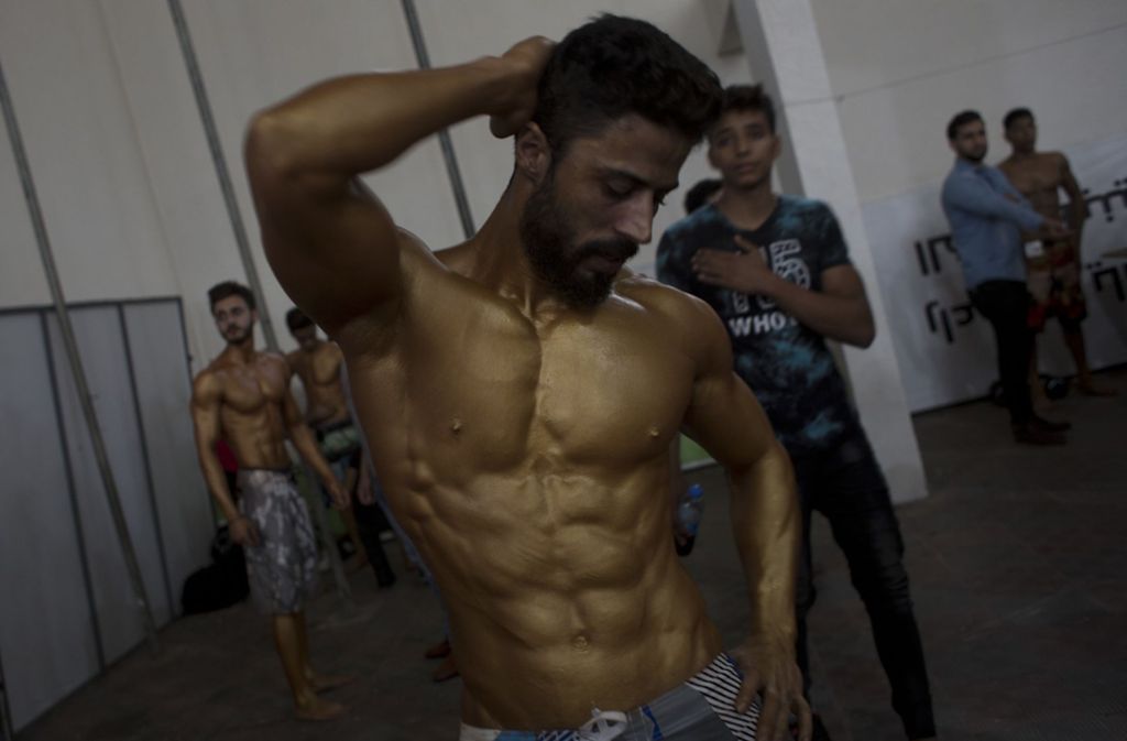 Ein Bodybuilder aus Palästina präsentiert seine Muskeln. Foto: AP
